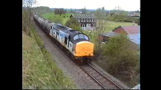 37418 passes Hampton with the Aberystywth oil tanks