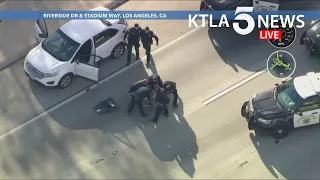 Pursuit ends near Dodger Stadium after officers deploy spike strip on 5 Freeway