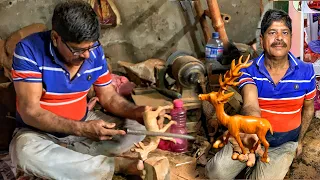 A talented local sculptor shows how he makes an amazing deer wooden sculpture