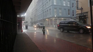 Rain from Hurricane Nate sweeps through the French Quarter in New Orleans