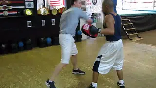 How to hit boxing pads with a pro