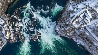 Waterfall Rheinfall and Castle Laufen, Schaffhausen from a drone in 4K