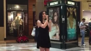 Girl singing whitney houston