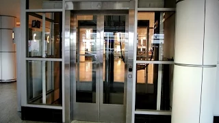 1980s Montgomery-KONE hydraulic glass elevators @ Montreal Trudeau Airport (YUL)