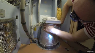 Replacing Solid Waste Container in the toilet - how to go to the toilet in space.