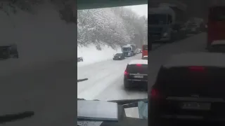 Audi Quattro pulling a truck in snow