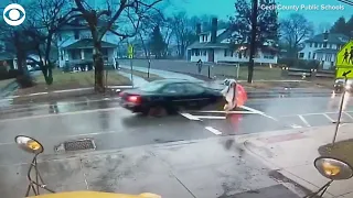 Maryland police officer pushes student out of the way of oncoming car
