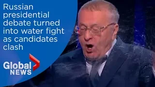 Russian presidential candidate throws water at opponent, sending debate off the rails