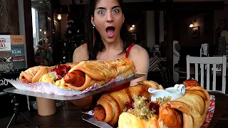 Girl eats 8LB of GIANT Pigs in blankets | Jingle Bell Hound | #LeahShutkever