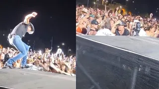 Tim McGraw FALLS OFF STAGE while performing in Arizona... but impressively recovers to greet fans...