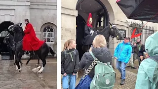 King's Guards' Helmet Fell off as The Cavalry Were Leaving the Horse Guards on a Rainy day in London