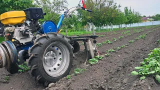 A HOMEMADE GRILLER AND MOTOR-BLOCK go like a train on rails.