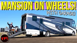 This Diesel Motorhome Lets You Bring Your Big Toys With You Inside Its Garage!