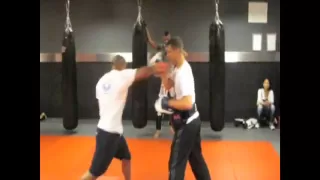 Tyrone Spong pads Training