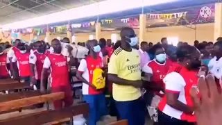 Funny Kenyan Arsenal fans giving offerings in the church after 2-0 win yesterday against Leicester!