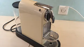 Nesspresso Delonghi EN Tabsmaschine reinigen öffnen Brühgruppe Kaffeeauslauf wasserpumpe