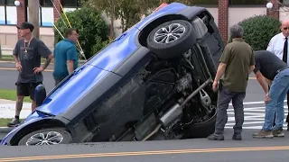 Large sinkhole swallows car in NY | Raw video