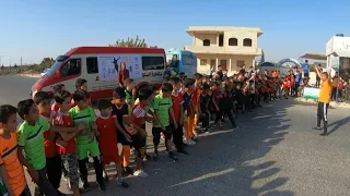 Syrian orphaned children race in Idlib | AFP