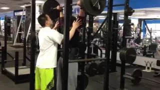 16 year old does a 265 pound over head press