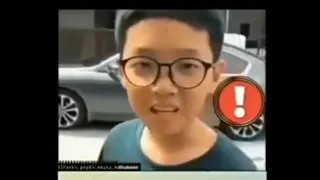 A Chinese boy speaking in tamil