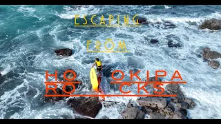 Getting Washed at the Hookipa Rocks with my windsurf gear /  Ricardo Campello