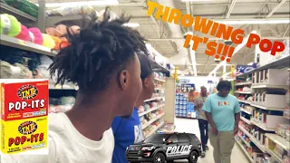 Throwing Pop Its on People In Walmart!! Prank**They called the Police!!***