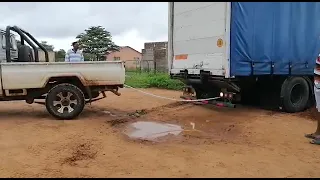 Land cruiser trying to pull a truck