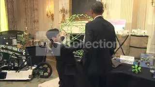 DC:OBAMA SCIENCE FAIR-BOY MESMERIZES OBAMA (CUTE)