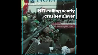 Collapsed railing causes fans to fall, almost taking out NFL player