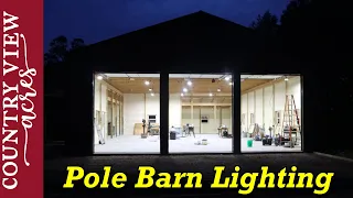 Very Bright Pole Barn Lighting and Concrete Apron in Front.  Cost of pole barn build so far.