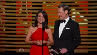 Bryan Cranston plants a passionate kiss on Julia Louis-Dreyfus at Emmy awards