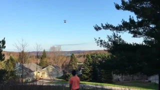 Amazon drone drops delivery on guys head