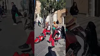 Troubadours sing Adriano Celentano in Taormina Sicily