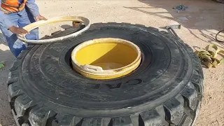 Changing tire/wheel loader caterpillar 950gc