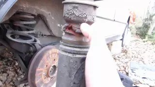 Comment démonter les amortisseurs arrière sur BMW E36