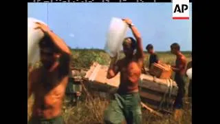 U.S. ARMY'S FLOATING ARTILLERY BASE POUNDS ENEMY POSITIONS IN VIETNAM - SOUND - COLOUR