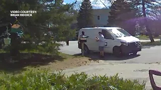 Video shows New England postal worker robbed at gunpoint