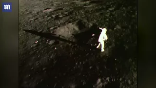 Richard Gordon orbits as the Apollo 12 team lands on the moon