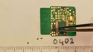 Placing SMD 0402 parts after using the Spoty solder paste dispenser
