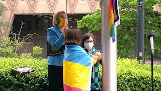 Mayor Durkan, Seattle LGBTQ+ Commission members raise Pride flag