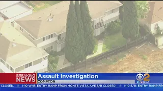 Deputies surround Compton apartment in assault investigation