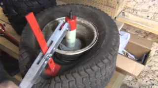How to change A Lawn Mower   ATV  4 Wheeler   Tire Using A Harborfreight Mini Tire Changer video