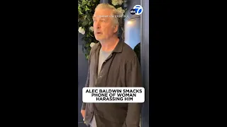 Alec Baldwin slaps phone of woman harassing him