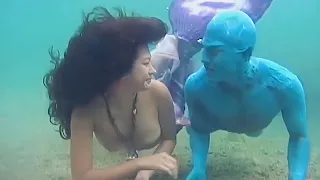 mermaid transformation - swiming in the sea