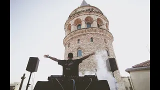 KU:ZU playing an exclusive live DJ-set from the view Istanbul Galata, In Turkey
