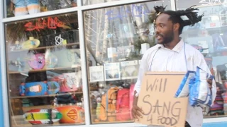 Homeless man sings John Legend's "All Of Me"