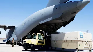 U.S. Air Force Airmen Loading Massive MQ-9 Reaper load onto C-17 Globemaster III