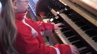 7 years old child plays a real church organ in Bavaria