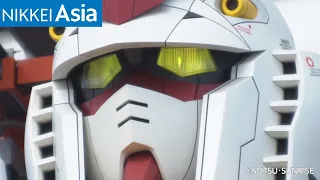 An 18-meter Gundam robot is really walking in Yokohama, Japan.