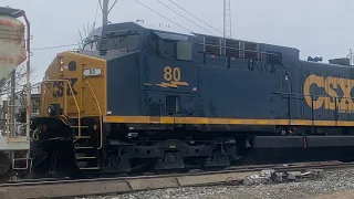 CSX M422-09 with Freshly Painted CW44AC Trailing